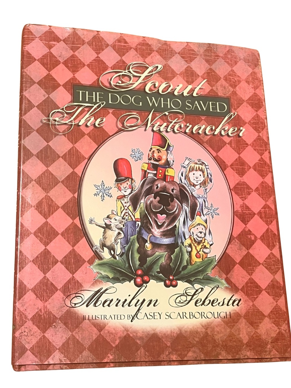 Scout: The Dog Who Saved the Nutcracker Hardcover Book by Marilyn Sebesta